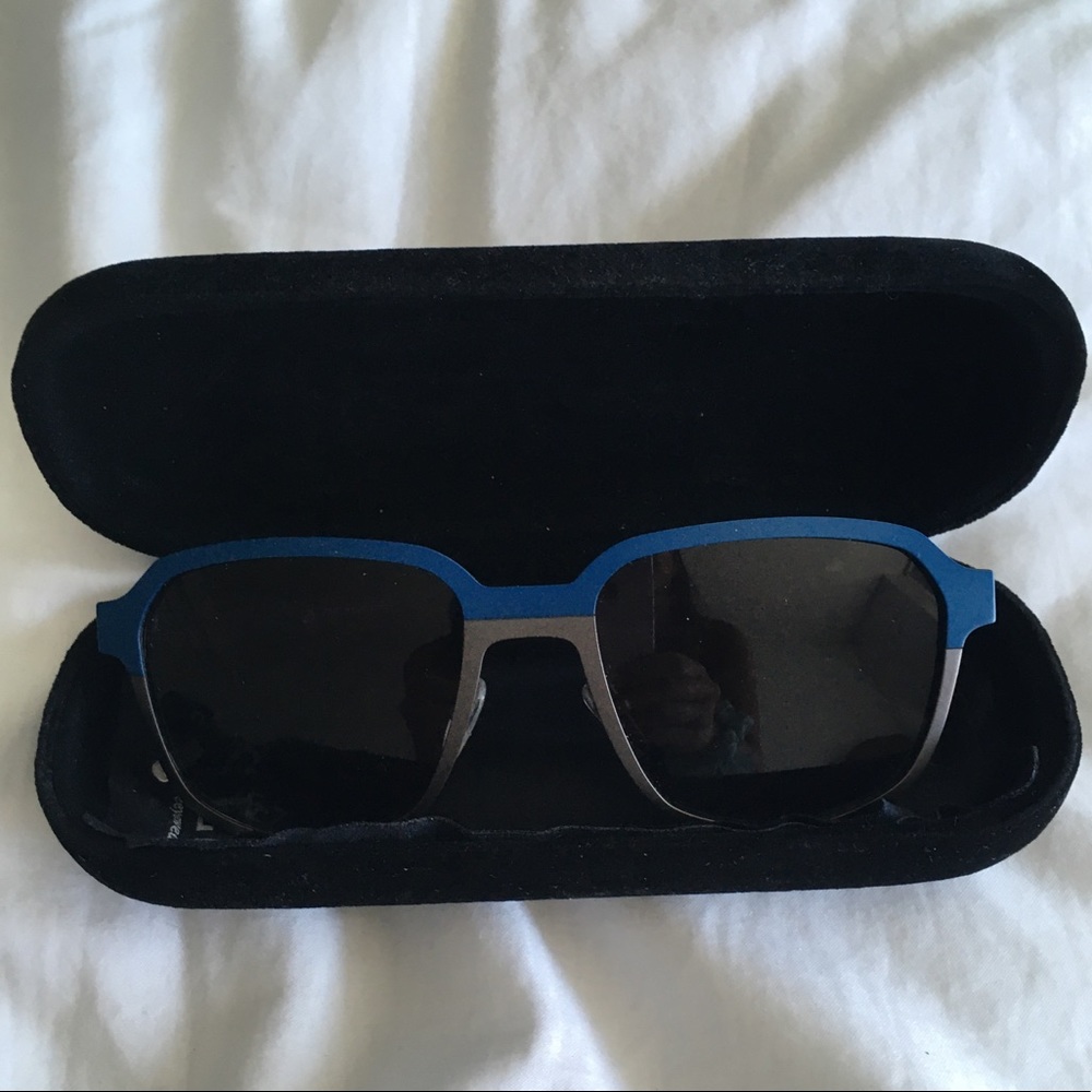 Two- toned Polarized SEE wear sunglasses.